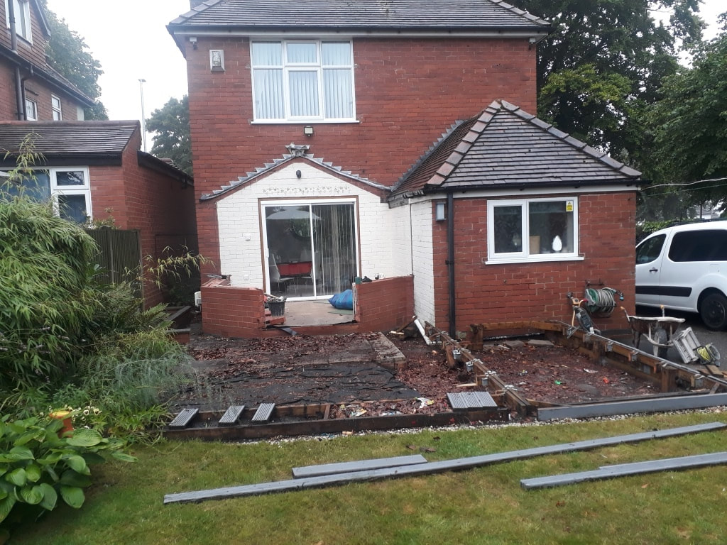 Installation of a warm roof conservatory & patio.